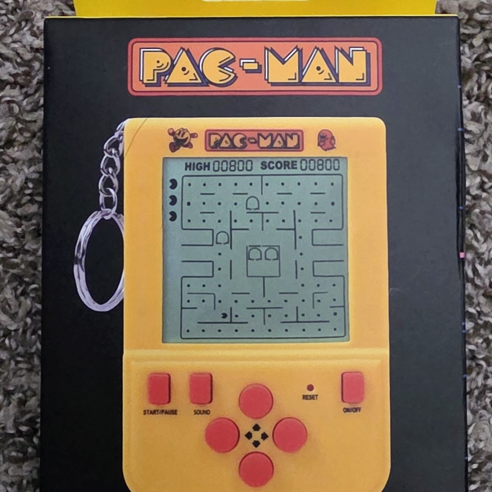Pac-Man Yellow Handheld Electronic Game -